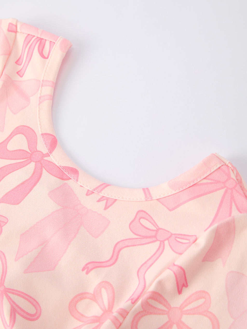 Brielle - Girl's Pink Bow Print Long Sleeve Jumpsuit